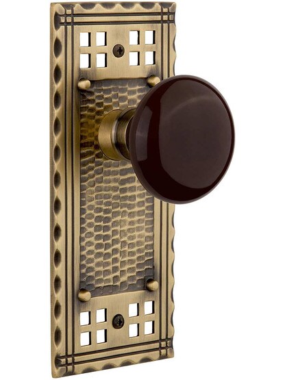 Pasadena Door Set with Brown Porcelain Knobs in Antique Brass.